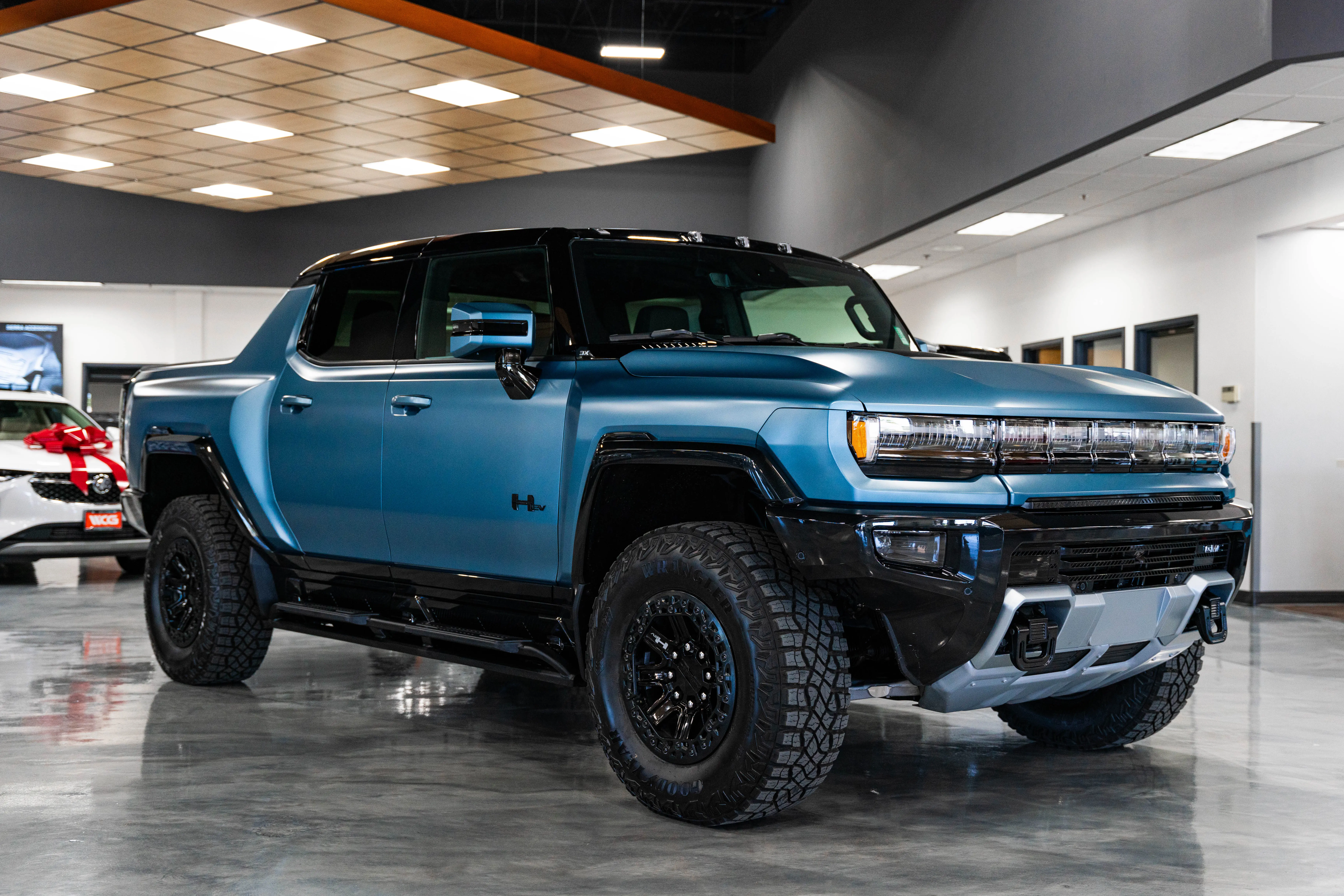 Blue Hummer at Weld County Garage Dealership